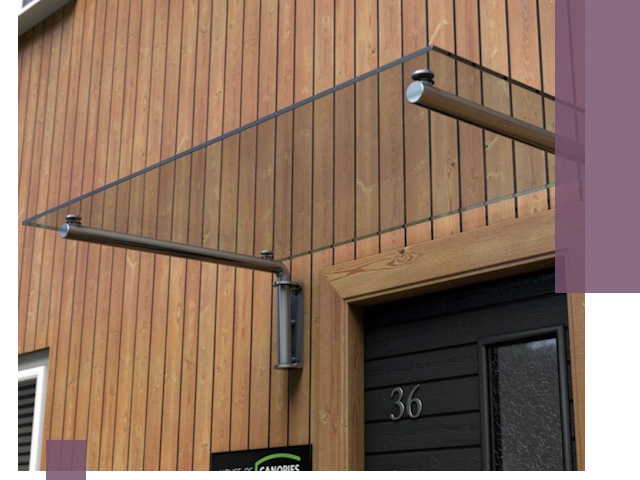 Стеклянные козырьки на входы и фасады в Ейске